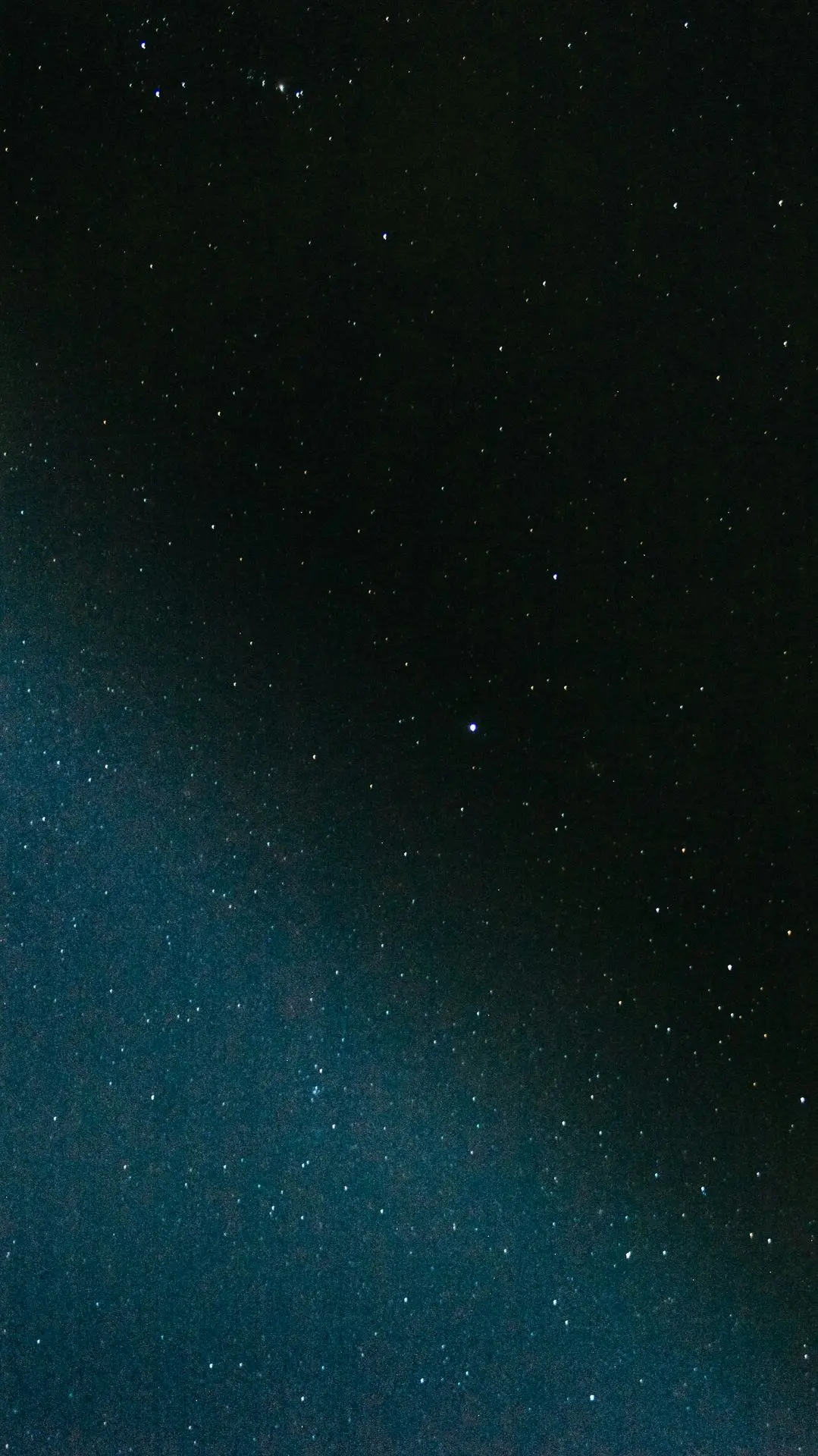blue and black starry night sky